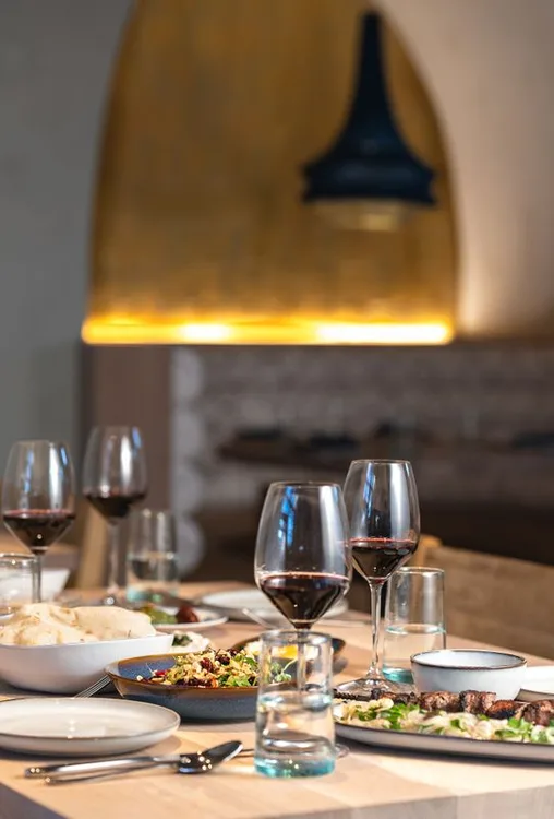 Set dining table inside Ladino in San Antonio